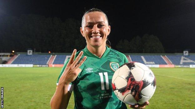 McCabe poses with the match ball