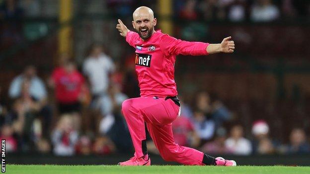 Sydney Sixers spinner Nathan Lyon celebrates taking the wicket of Melbourne Stars batsman Ben Dunk in the Big Bash final