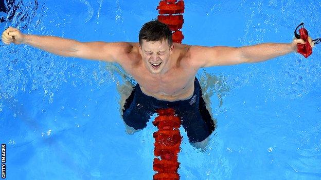 Adam Peaty celebrates Olympic gold