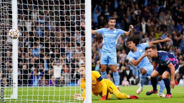 Nathan Ake heads Manchester City into the lead against B Leipzig in the Champions League