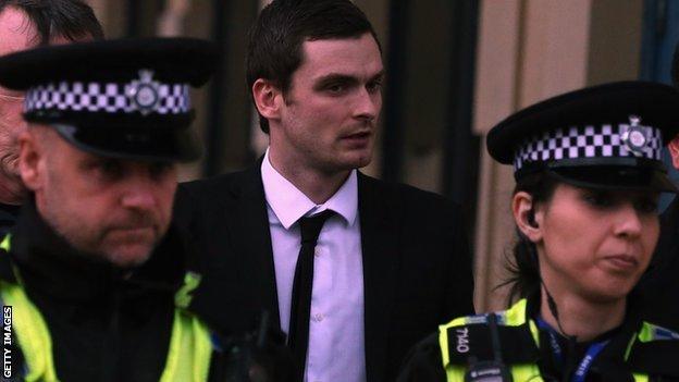 Adam Johnson leaving court during his trial