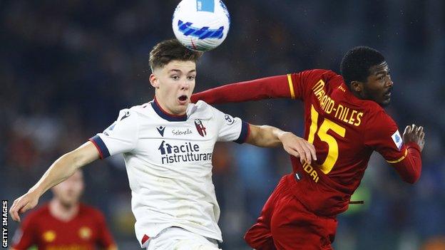 Left-back Aaron Hickey (left) in action for Bologna