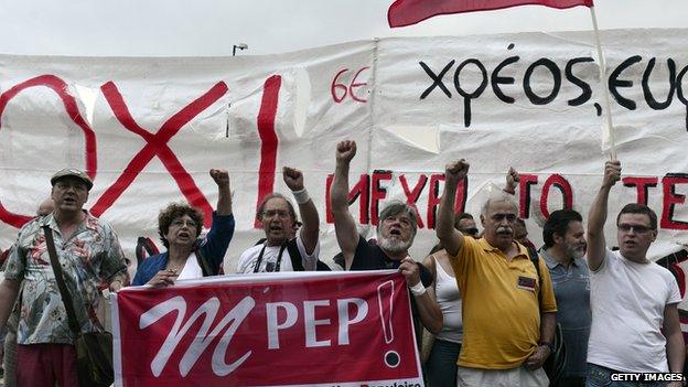 Foreign anti-EU activists protest in front of the Greek parliament in Athens, during a demonstration calling for 'NO' at referendum and for Greece's exit from the eurozone on June 28, 2015.