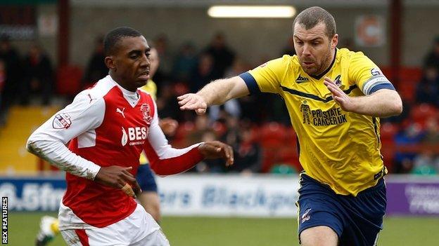 Scunthorpe's Stephen Dawson (yellow) in action at Fleetwood