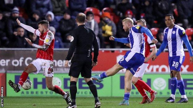 Stephen Humphrys scores for Wigan at Rotherham