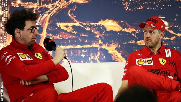 binotto and sebatian vettel