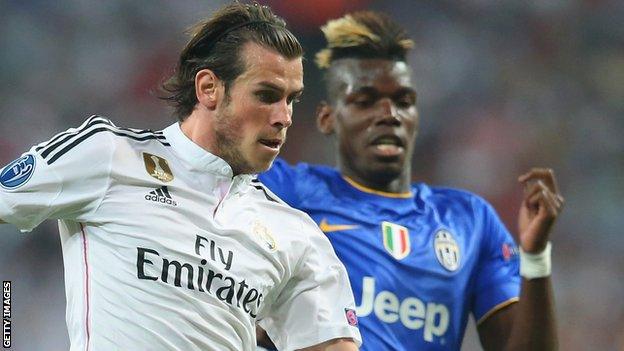 Gareth Bale vies with Paul Pogba during a Champions League semi-final between Real Madrid and Juventus in 2015