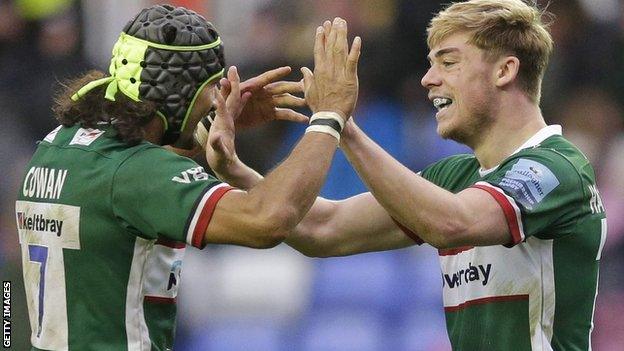 London Irish players celebrate a try