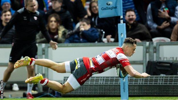 Charlie Chapman scores a try for Gloucester against Exeter