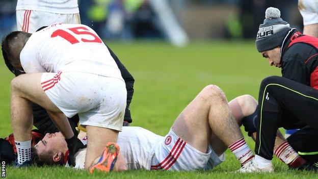 Connor McAliskey receives treatment at Breffni Park