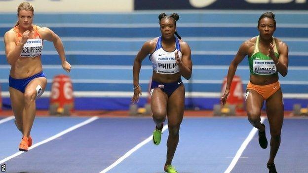 Asha Philip produced a competitive time but came fifth in a high-calibre heat won by Ivory Coast's Murielle Ahoure (right)