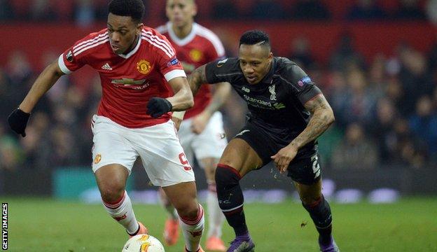 Martial (left) evading Nathaniel Clyne