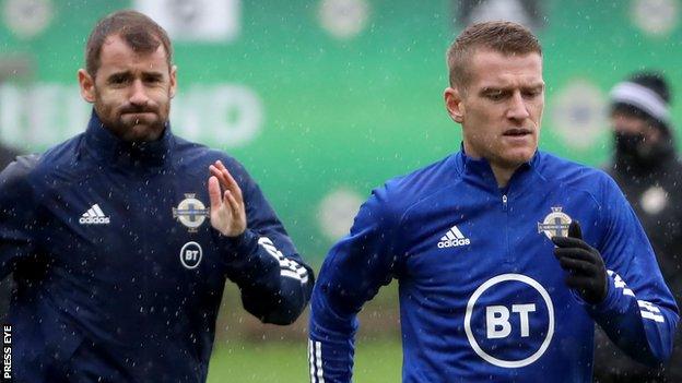 Niall McGinn and Steven Davis will miss the Romania game in Belfast