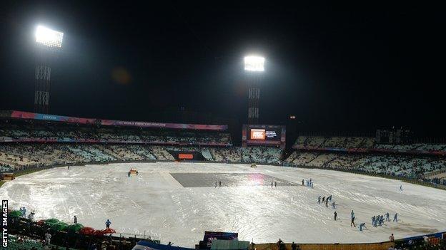 The outfield completely covered from the rain at Eden Gardens in Kolkata