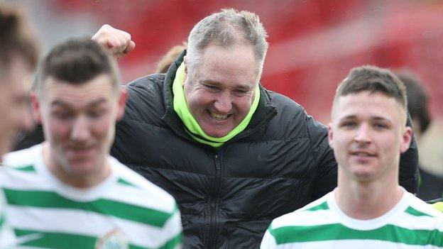 Lurgan Celtic manager Colin Malone (centre) celebrates after his team's Irish Cup victory over Portadown