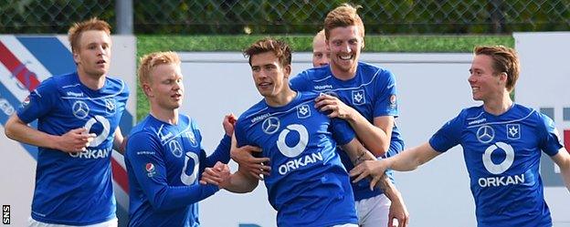 Stjarnan celebrate the opening goal from Olafur Karl Finsen (centre)