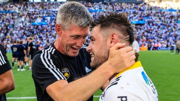 Ronan O'Gara celebrates winning the Champions Cup with La Rochelle back Arthur Retiere