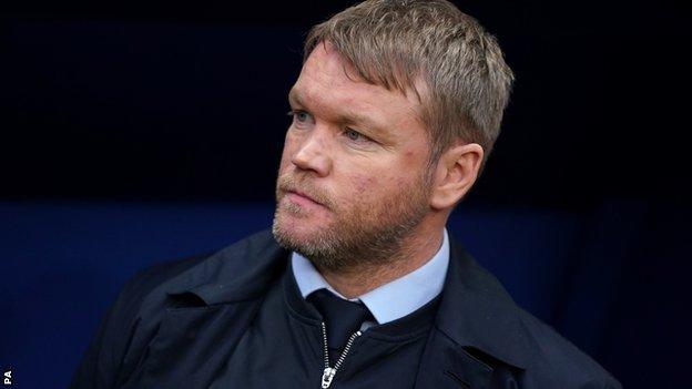 Grant McCann watches on