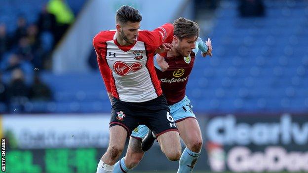 Wesley Hoedt shields the ball