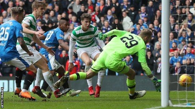 Alfredo Morelos (third from left) watches his late effort hit the post