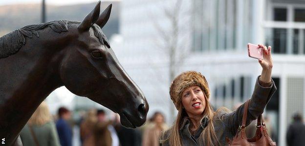 A racegoer takes a selfie with Best Mate