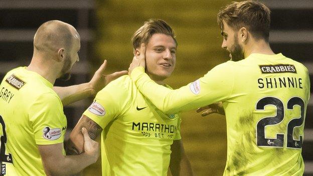 Jason Cummings (centre) celebrates for Hibs