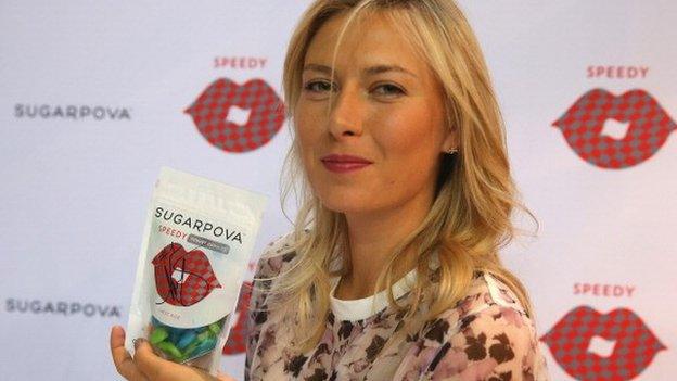 Maria Sharapova holds Sugarpova candy