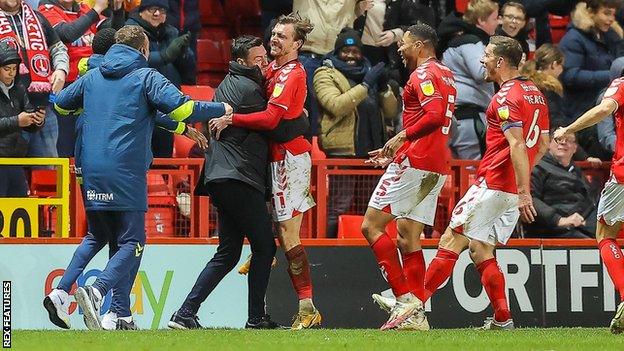 Johnnie Jackson's players celebrated with him