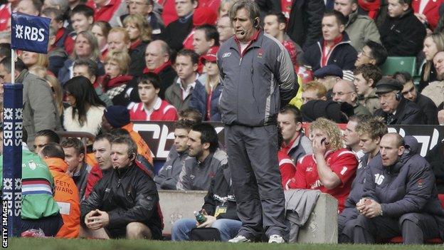 Scott Johnson watching Wales in action with Gareth Thomas on the bench