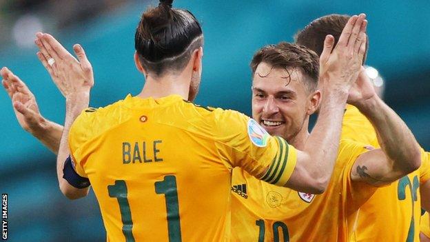 Wales' Gareth Bale and Aaron Ramsey celebrate