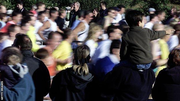 Spectators cheer on runners at the Great North Run