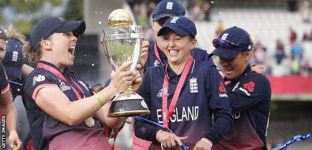 England women's captain Heather Knight lifts the World Cup