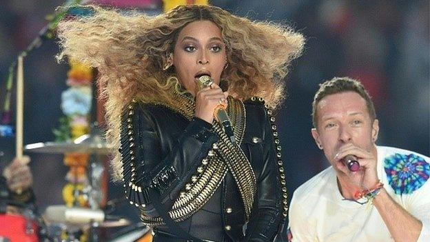 Beyonce performing with Chris Martin from Coldplay
