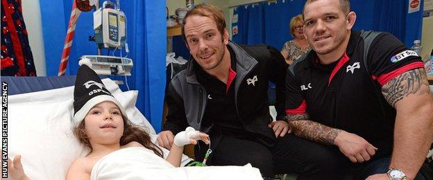 Alun Wyn Jones and Paul James on a visit to the children's ward at Morriston Hospital