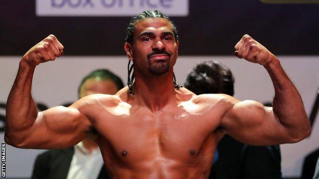 David Haye poses on the scales