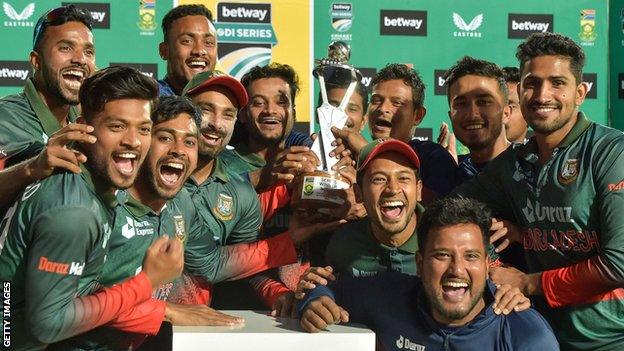 Bangladesh celebrate with the ODI series trophy