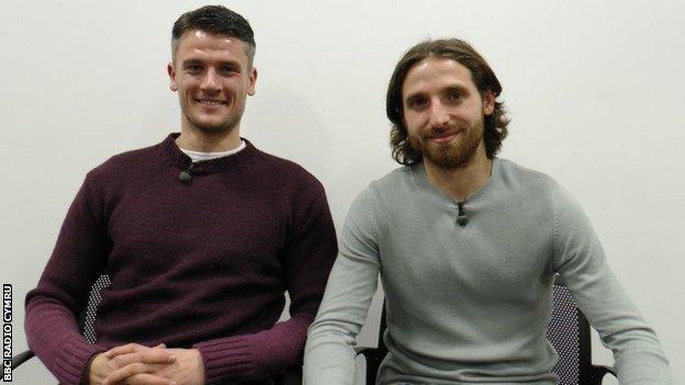 Joe Allen (right) with former Swansea City and Wales team-mate Owain Tudur Jones