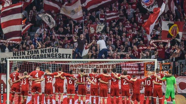 Bayern's players salute the home supporters at the Allianz Arena after the game