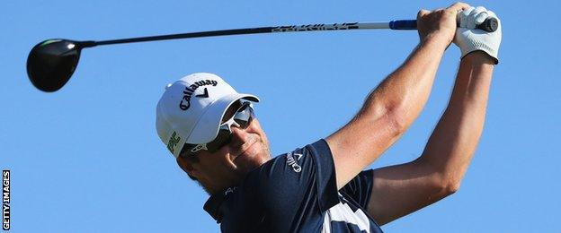 Marc Warren hits a shot in Portugal