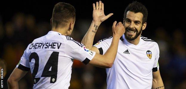 Alvaro Negredo and Denis Cheryshev celebrate