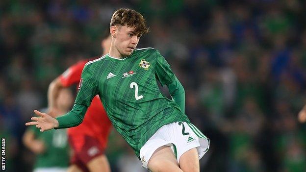 Conor Bradley in action for Northern Ireland