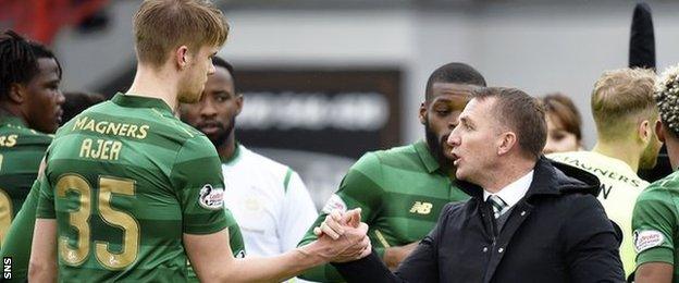 Kristoffer Ajer and Brendan Rodgers celebrate Celtic's win over Hamilton