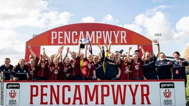 Cardiff Met players celebrate their Genero Adran Trophy win over Cardiff City