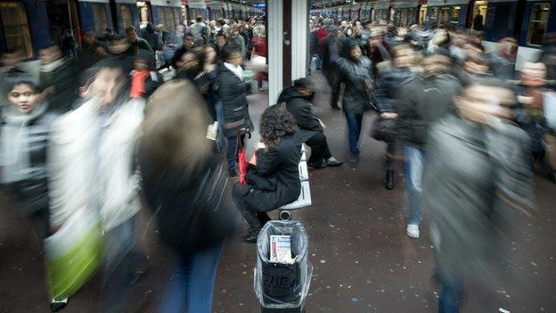 Blurry crowd at a train station