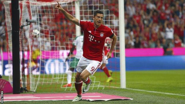 Bayern Munich forward Robert Lewandowski celebrates scoring against Werder Bremen