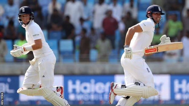 Joe Root and Alastair Cook run between the wickets