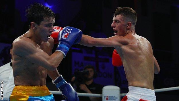 Niall Farrell (right) fighting for the British Lionhearts in 2017