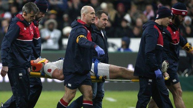 Dylan Hartley is carried off