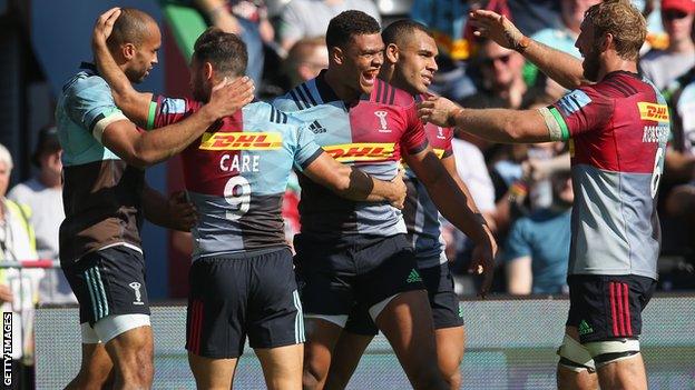 Harlequins celebrate a try