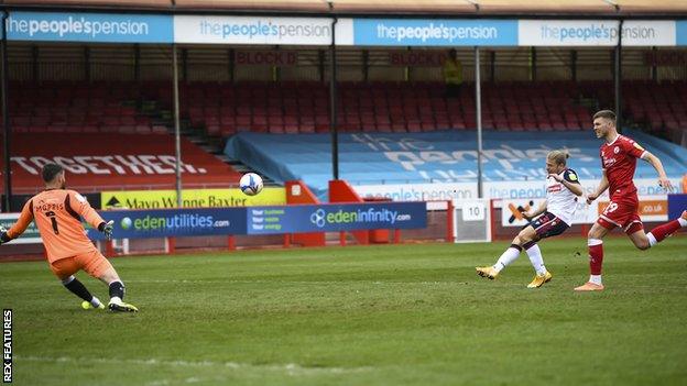 Lloyd Isgove scores for Bolton Wanderers against Crawley Town